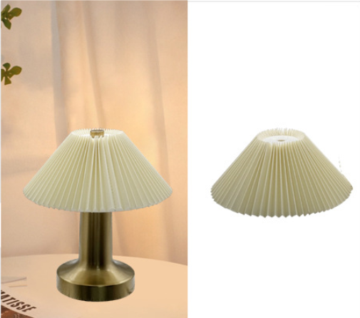 Classic pleated lampshade with precise even folds in neutral fabric